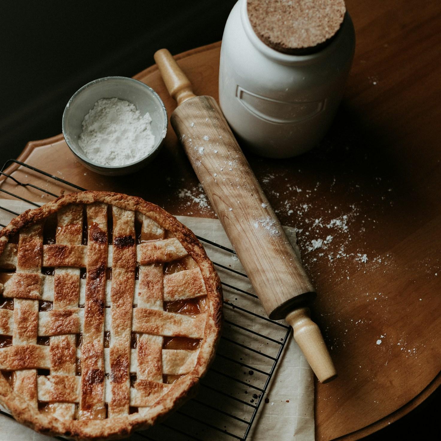 People working together in a contemporary kitchen, sharing recipes and cooking tips